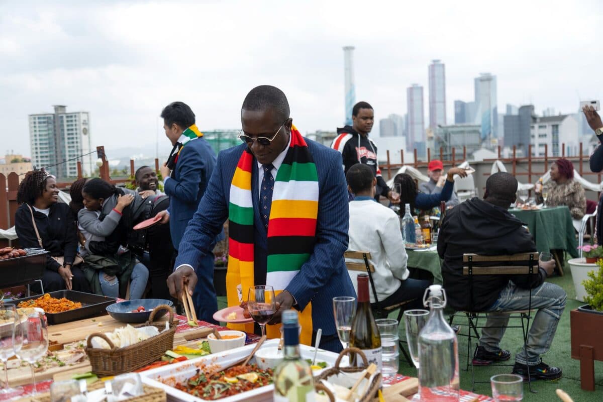Community rooftop feast — Zimbabwe Independence Day 2023